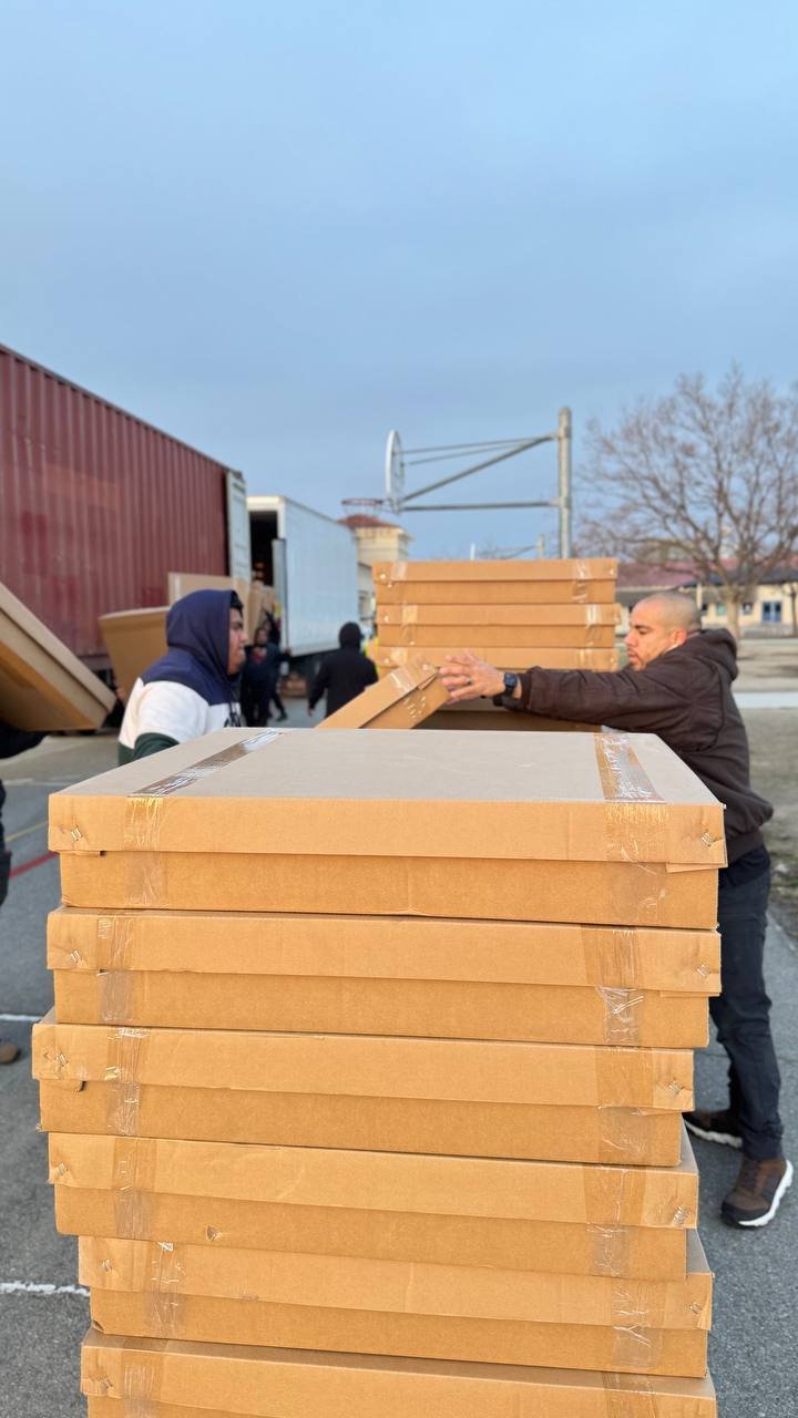 Packaged office furniture prepared for delivery or warehouse storage